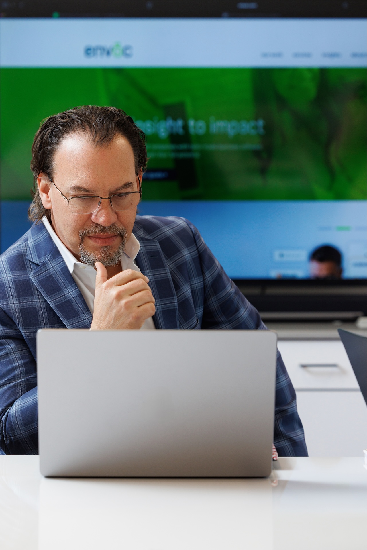 Calvin Fabre looking at computer screen
